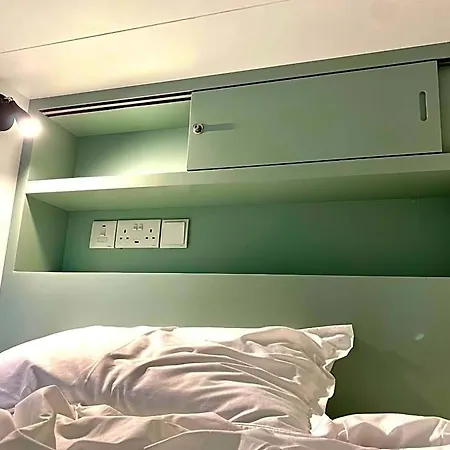 Urban Habitat Capsule Beds Hostel