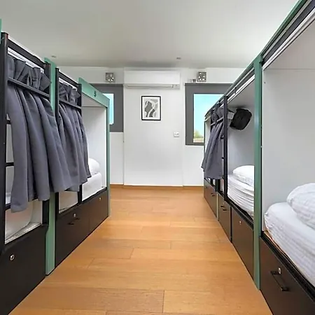 Urban Habitat Capsule Beds Hostel