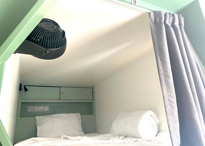 Urban Habitat Capsule Beds Hostel *